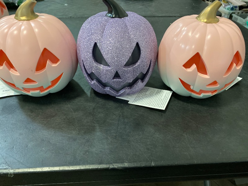 Photo 1 of 3 pack 2 pinks 1 purple Light-up Halloween Pumpkin Trio with Glitter 