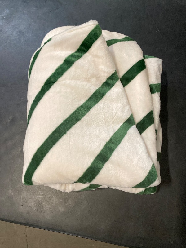 Photo 1 of Candy Cane Striped Printed Plush Throw Blanket with Faux Shearling Reverse Ivory/Green - Threshold™