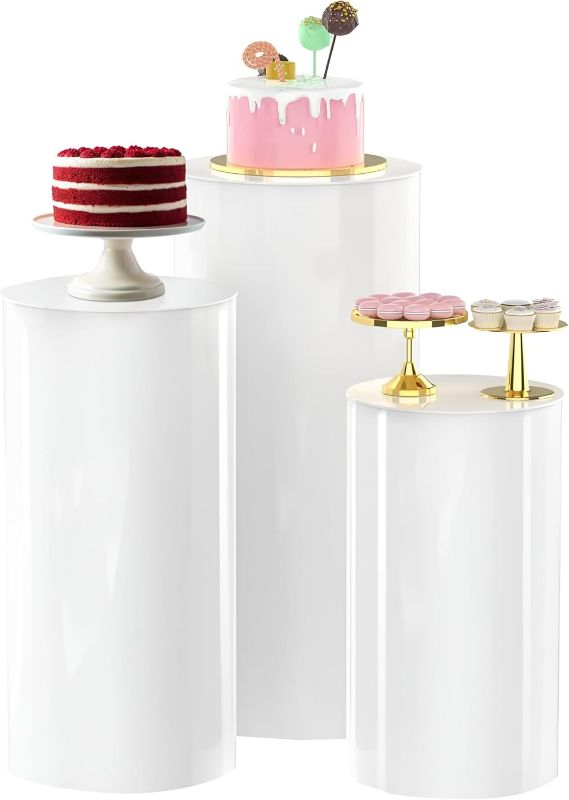 Photo 1 of White Cylinder Pedestal Stands - 3 Pieces - White Party Cylinder Table for Wedding Party or Babyshower - Party Decor - 35.4''(L),29.5''(M),23.6''(S)