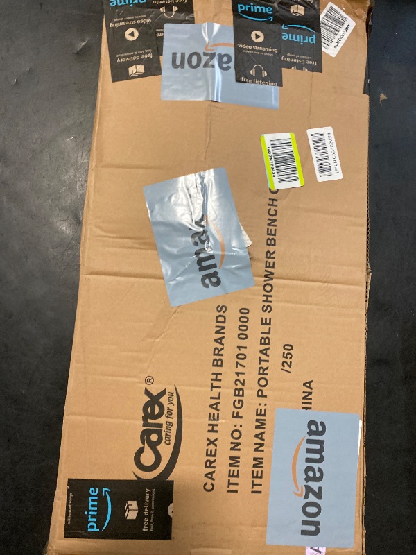 Photo 1 of Carex Portable Shower Bench - Shower Bath Seat - Fits tub having width in the range of 19"-28". Comfortable Contoured Seating Area with 300 Pound Weight Capacity, Portable and Easy to Store