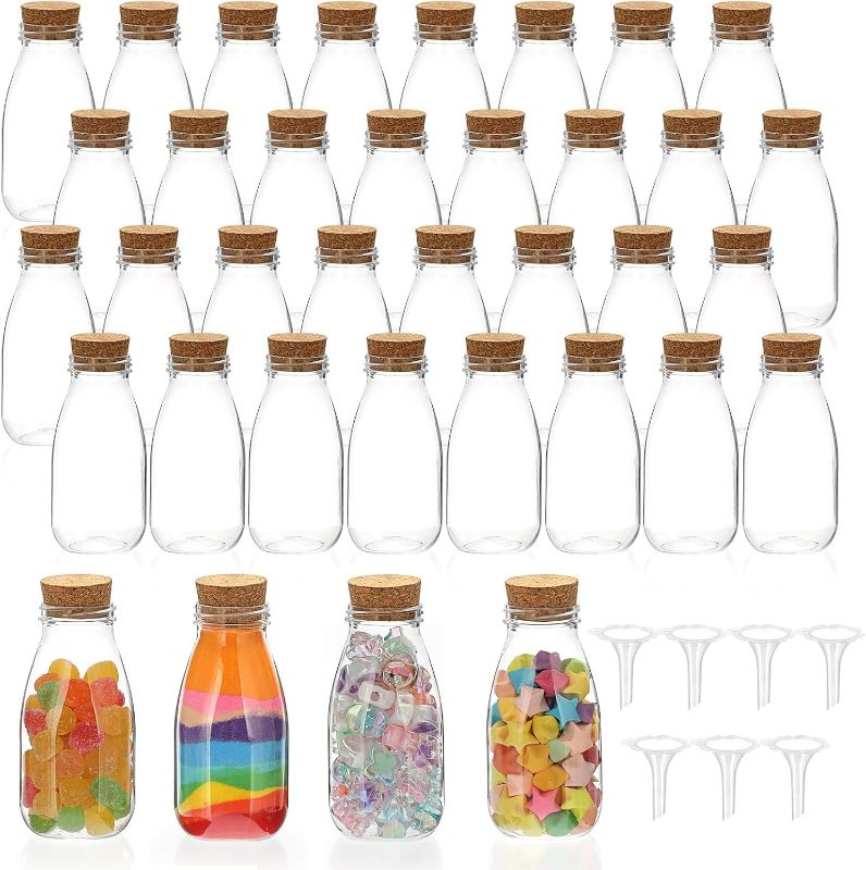 Photo 1 of BTSKY 36 Pcs 4oz Plastic Mini Potion Bottles Small Jars with Cork Lids DIY Decoration Clear Sand Art Bottles Tiny sand Jars Wishing/Message Bottle for Halloween Decorations, Wedding/Party Favors