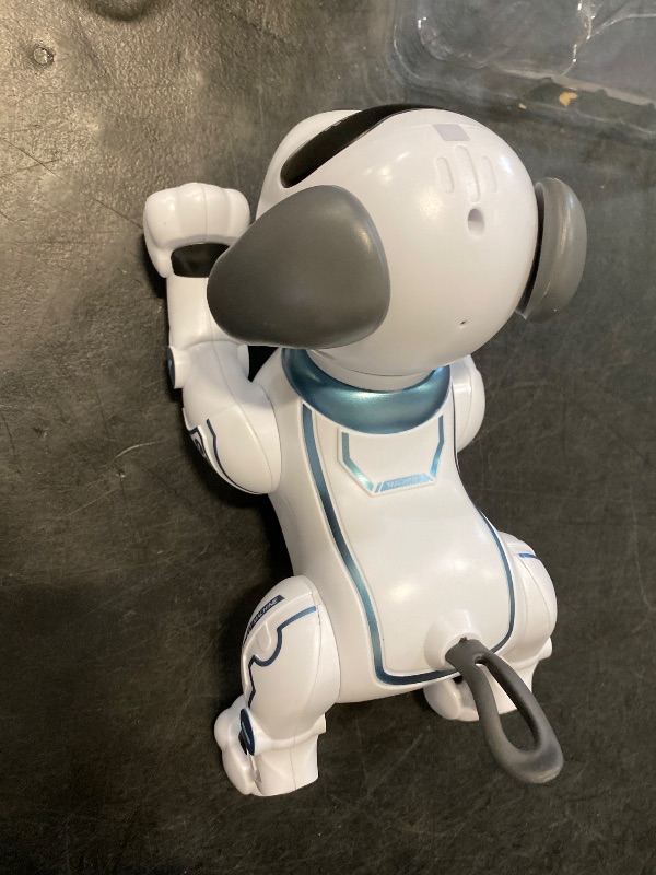 Photo 1 of Fisca Remote Control Dog, RC Robotic Stunt Puppy Voice Control Toys Handstand Push-up Electronic Pets Dancing Programmable Robot with Sound for Kids Boys and Girls Age 6, 7, 8, 9, 10 Year Old