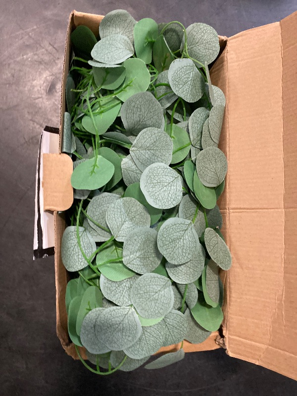 Photo 1 of CQURE 72Pcs Eucalyptus Garland,Artificial Eucalyptus Leaves Table Greenery Garland Wreath Vines for Wedding Party Table Fireplace Wall Room Decor