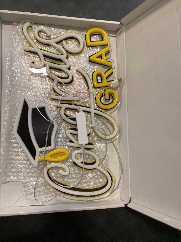 Photo 1 of SELICOR Congrats Grad Neon Sign with Cap - 16.5" x 10", Adjustable LED Light Up Sign for Prom Party, Photos, Class of 2025 Celebrations, Graduation Gift for Dorm Backdrop Room Decor
