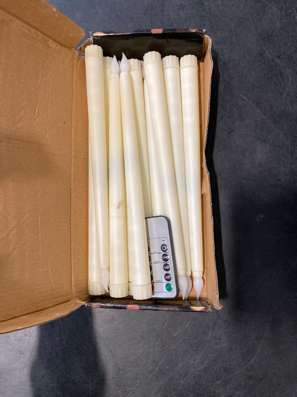 Photo 1 of Sequpr 12 Pcs Flameless Taper Candles Flickering with Remote Timer, Battery Operated Taper Candles, 10.63inches Led Candlesticks for Christmas, Thanksgiving, Church, Wedding Decorations(Ivory)