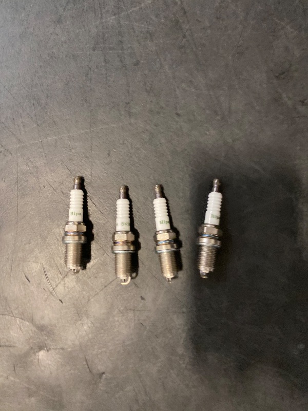 Photo 1 of Genuine Honda Spark Plug 98079-5514G, set of 4