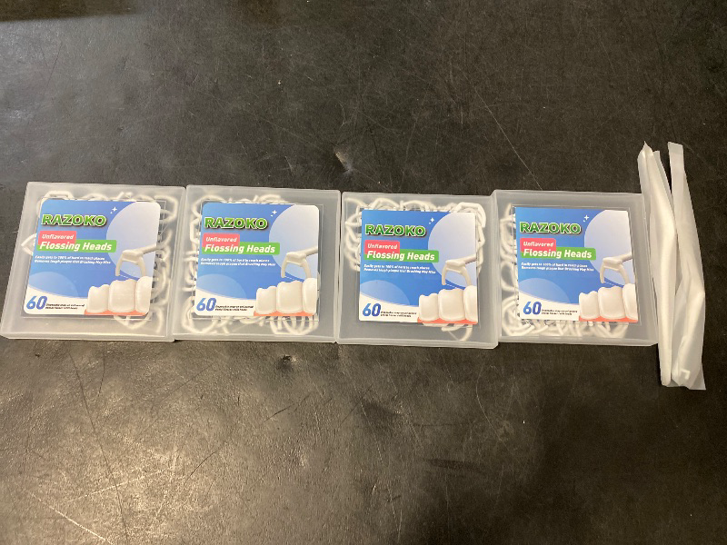 Photo 1 of RAZOKO Ultimate Flosser Kit with 2 Handles and 240 Extra Strength Refills