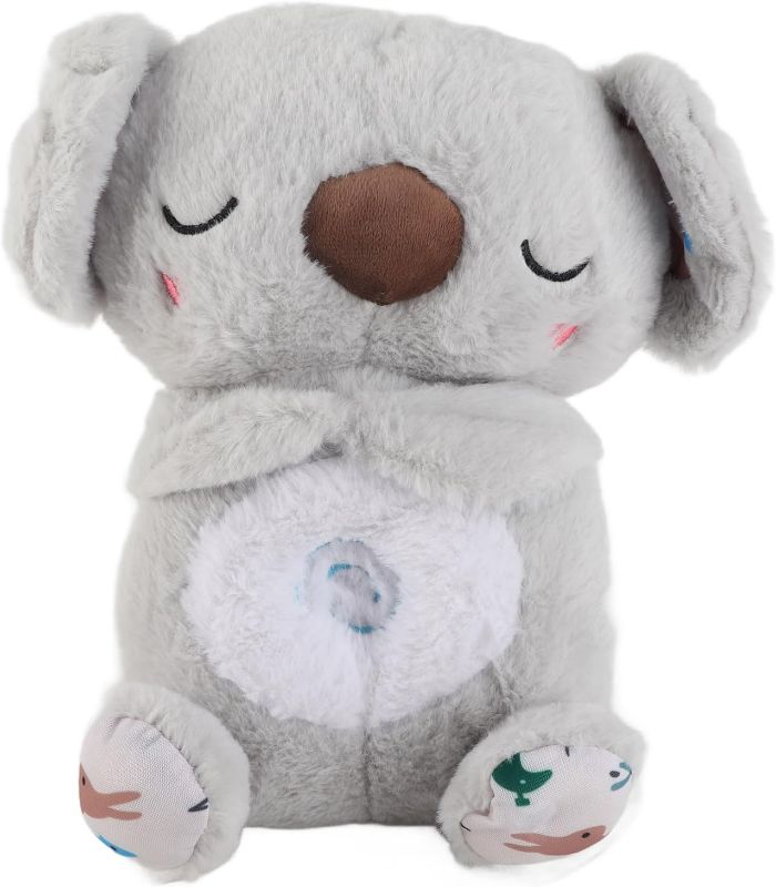 Photo 1 of RiToEasysports Relief Koala Bear, Baby Sound Machine Soothe Snuggle Sensory Details Music Lights Rhythmic Breathing Motion Musical Plush Toy Anxiety Relief Koala 27cm for Babies