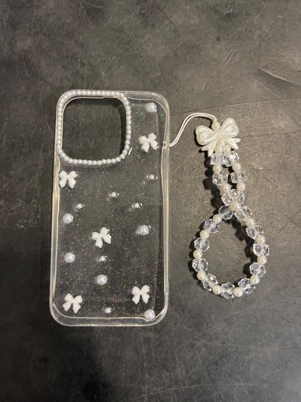 Photo 1 of MINSCOSE for iPhone 12 Pro Max Clear Glitter Case, Cute Bow Pearl Aesthetic Girly Transparent Phone Case with Phone Charms Chain Bracelet,Soft Protective Cover for iPhone 12 Pro Max-White