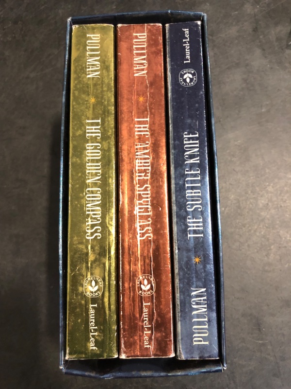 Photo 1 of His Dark Materials 3-Book Mass Market Paperback Boxed Set: The Golden Compass; The Subtle Knife; The Amber Spyglass