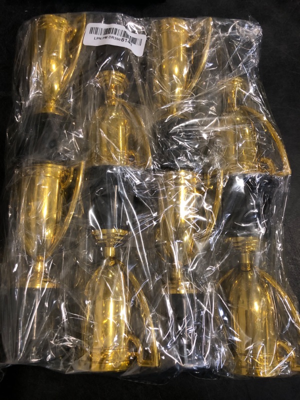 Photo 1 of Cotiny 8 Pcs 6 Inch Mini Trophies Plastic Gold Trophy Cups Small Trophies Bulk for Kids Sports Tournament Participation Rewards Competitions Party Favors