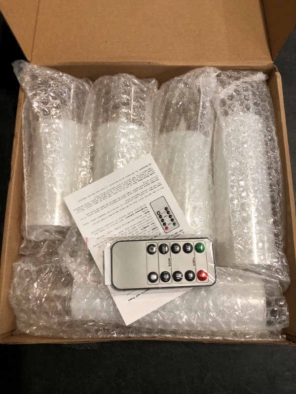 Photo 1 of Amagic Pure White Flameless Candles, Battery Operated Candles, Acrylic Flickering LED Pillar Candles with Remote Control and Timer, 3D Wick, Yellow and Blue Glow, D2.2 xH5 5" 6" 7" 8", Set of 5