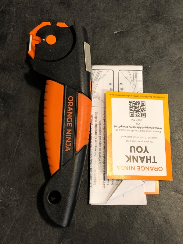 Photo 1 of Orange Ninja All-in-1 Garden Tool & Knife Sharpener for Lawn Mower Blade, Axe, Hatchet, Machete, Pruner, Hedge Shears by Sharp Pebble