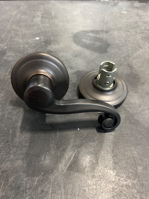 Photo 1 of Kwikset Lido Interior Passage Door Handle, Lever For Closet and Hallway Doors, Reversible Non-Locking Handle Lever, Venetian Bronze, with Microban Protection