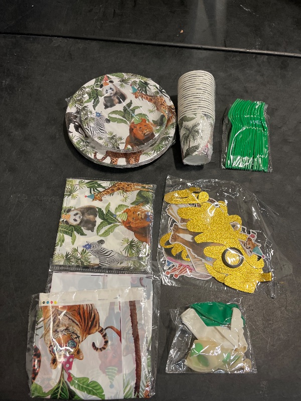 Photo 1 of Jungle Theme Safari Birthday Party Decorations, Wild Animal Plates and Napkins for Boy Kids Jungle Dinnerware with Cups Tablecloth Banner and Balloons for Zoo Theme Birthday Decorations,Serve 20