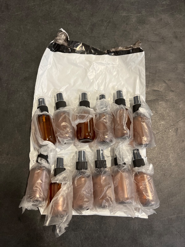 Photo 1 of SYNTECSO 48 Pack 2oz Amber Plastic Spray Bottles, Fine Mist Spray Bottles for Essential Oils, Water Spray Bottle for Hair Plant & Cleaning Solution