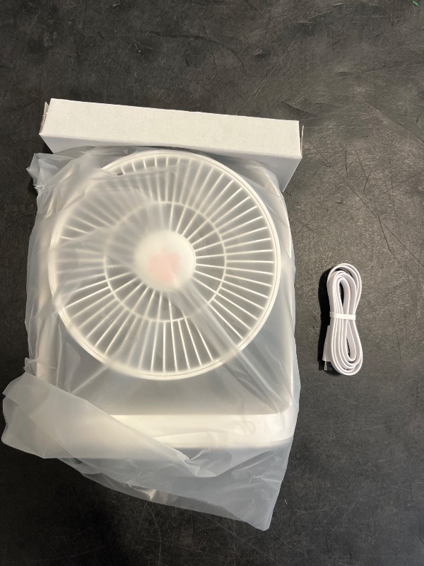 Photo 1 of JISULIFE Desk Fan, Small Portable Battery Operated Desktop and 4000mAh USB Rechargeable Electric Table Fan with 4 Speeds, Max 15 Hrs, Strong Airflow, Ultra Quiet for Office/Room/Travel-White
