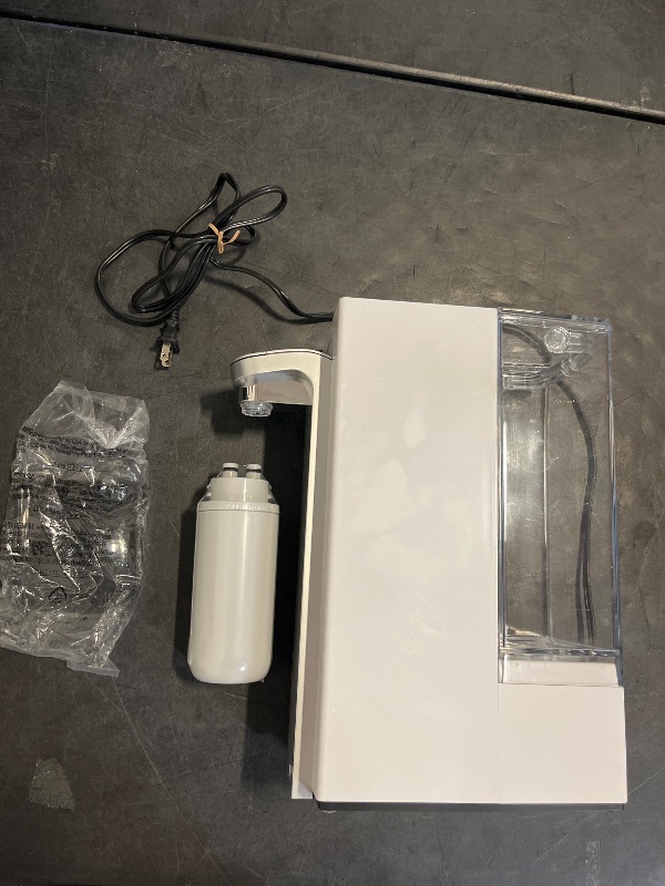 Photo 1 of Brita Hub Compact Instant Powerful Countertop Water Filter System, Reduces 70+ Contaminants, 9 Cup Water Reservoir, Includes 6 Month Carbon Block Filter, White, 87344