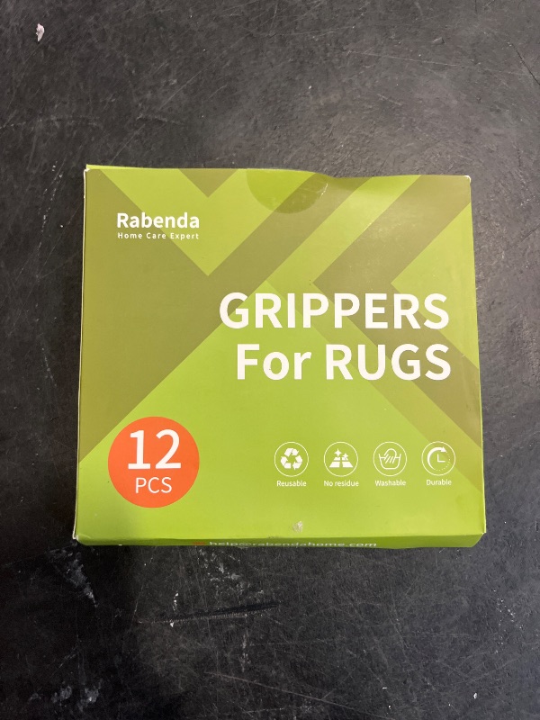 Photo 1 of Rabenda 12 Pcs Rug Tape, Non Slip Rug Pads Grippers for Hardwood Floors and Tiles, Reusable Carpet Tape for Area Rugs, Double-Sided Adhesive Rug Stickers Keep Corners Flat (Black)