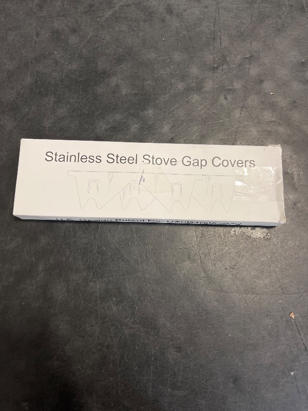 Photo 1 of Stainless Steel Stove Gap Covers,Stove Gap Filler, Range Trim Kit, Stove Gap Guards, Heat Resistant and Easy to Clean, Easy retractable Length 13.8" to 27.5", Width 0.79",Black(2PCS)