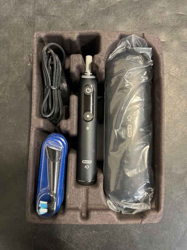 Photo 1 of Oral-B iO Series 9 Electric Toothbrush with 3 Replacement Brush Heads, Black Onyx