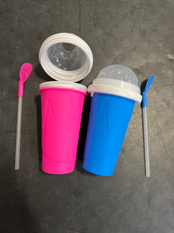 Photo 1 of Slushie Cup, 2 Pack Slushy Maker Cup, Frozen Magic Squeeze Cups for Juice Milk Yogurt Ice Cream Make, DIY Smoothie Cooling Cup with Lid & Straw for Kids Friends Family (Blue+Pink)