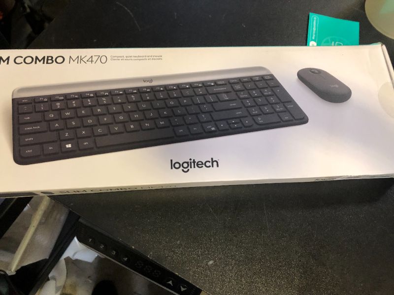 Photo 1 of Logitech MK470 Slim Wireless Keyboard and Mouse Combo - Modern Compact Layout, Ultra Quiet, 2.4 GHz USB Receiver, Plug n' Play Connectivity, Compatible with Windows - Graphite