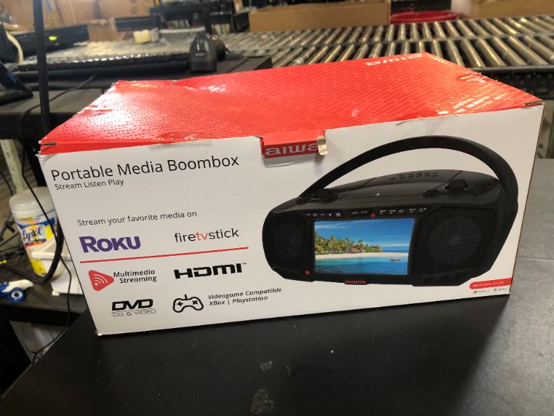 Photo 1 of Aiwa Portable Boombox, Crystal Clear Sound with 3W x 2 Speakers and Bass Function, Featuring a 7" LCD Display, Bluetooth Connectivity, FM Radio, CD/DVD Player, Streaming on Roku and Amazon Firestick