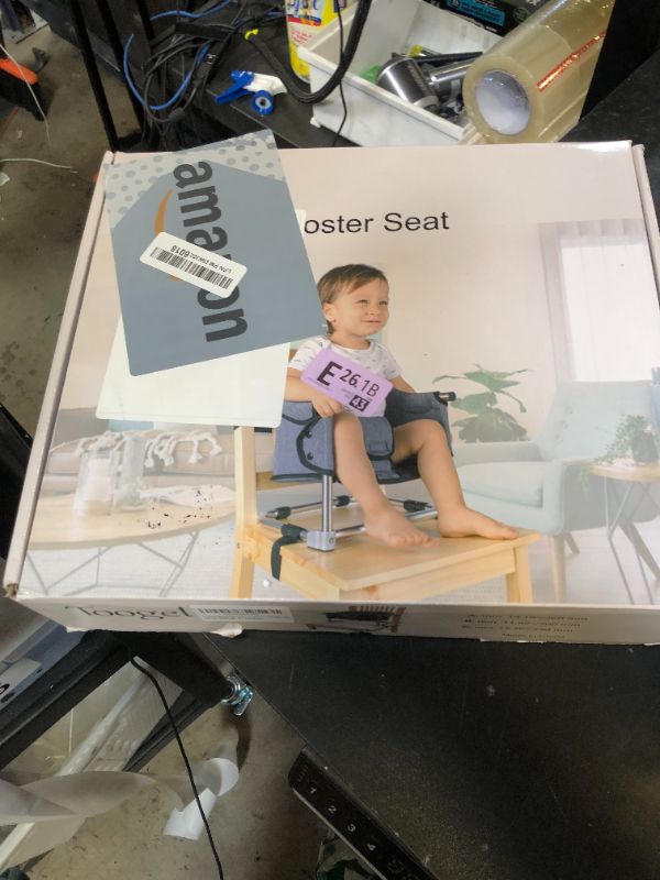 Photo 1 of Booster Seat for Dining Table: Portable Toddler Booster Chair with Safety Buckle and Height Adjustable, Foldable Baby Feeding Chair, Kids High Chair Booster Seat for Kitchen Home Travel - Black