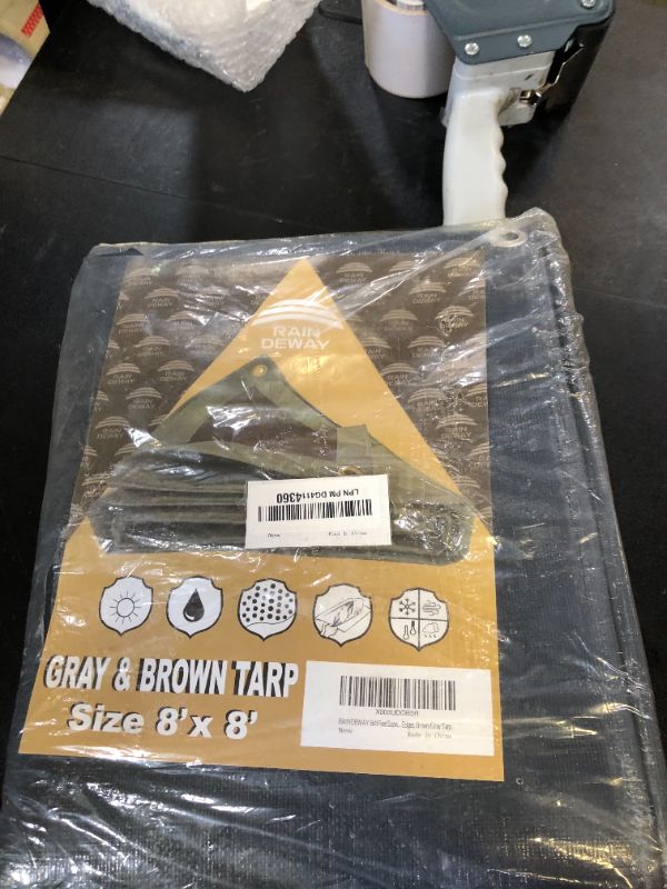 Photo 1 of RAINDEWAY 8x8 Feet Super Heavy Duty Tarp 18 Mil, UV Resistant, Weatherproof, Multipurpose Waterproof Poly Tarp with Grommets and Reinforced Edges, Brown/Gray Tarp, Gray/Brown-18mil