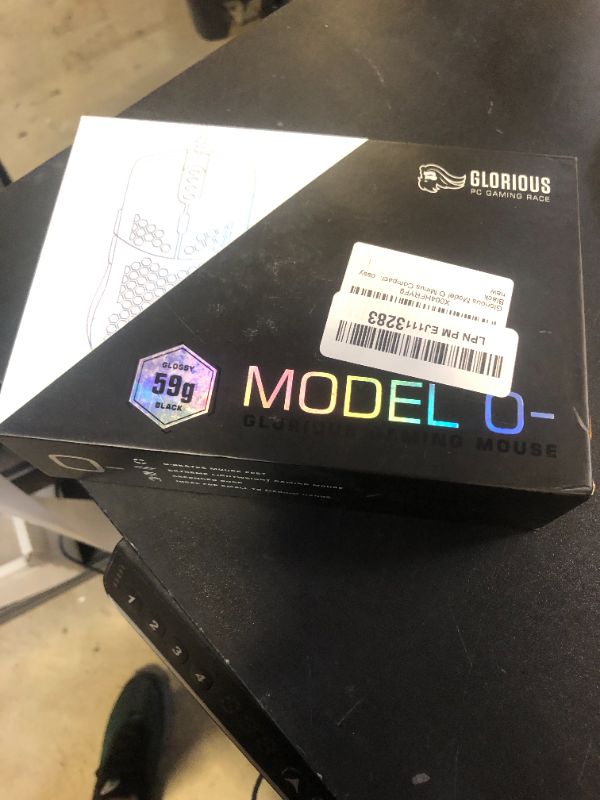 Photo 1 of Glorious Model O- (Minus) Compact Wired Gaming Mouse - 58g Superlight Honeycomb Design, RGB, Pixart 3360 Sensor, Ambidextrous, Omron Switches - Glossy Black