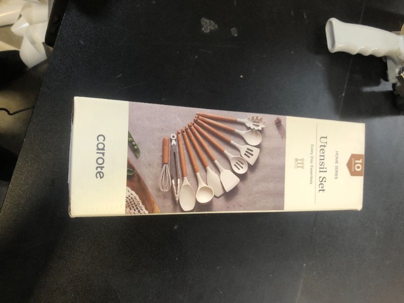 Photo 1 of CAROTE Silicone Cooking Utensils Set, Kitchen Utensils Set 10 Pcs for cooking, BPA Free Spatula Set with Heat Resistant Wood Handles for Nonstick Cookware (Cream White)