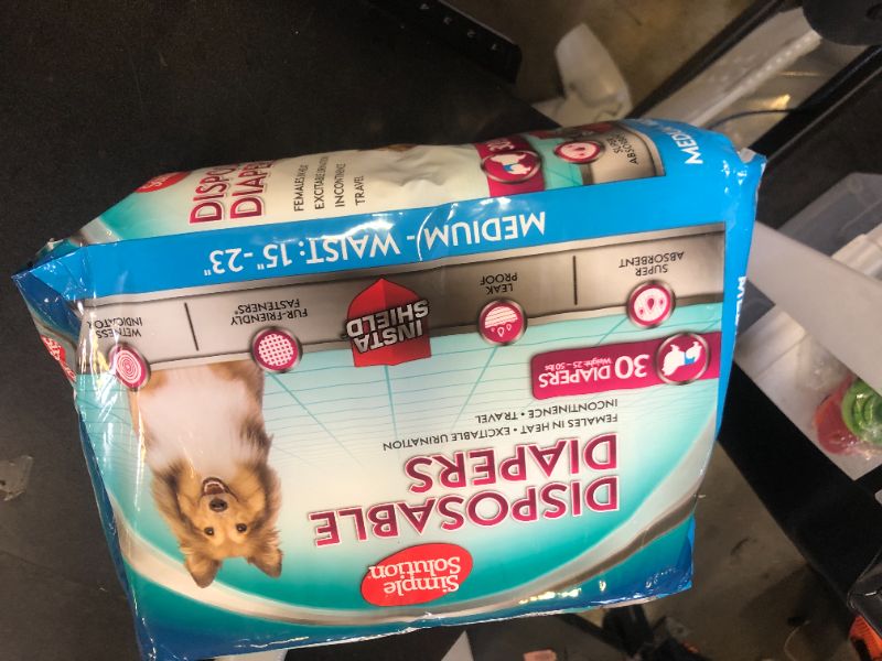 Photo 1 of Simple Solution Disposable Dog Diapers, Female Dog Diapers, Puppy Potty Training, Incontinence and Heat Cycle Protection, Medium Diapers for Dogs, 15-23 Inch Waist, 30 Count