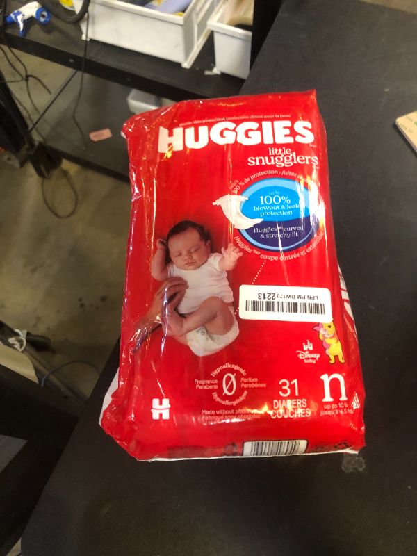 Photo 1 of Huggies Newborn Diapers, Little Snugglers Baby Diapers, Size Newborn (up to 10 lbs), 31 Count