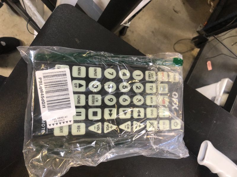 Photo 1 of QFX REM-115 8 in 1 Large Jumbo Universal Remote Control for RCA, Sony, Philips, Samsung, GE, Zenith, Panasonic, Sharp, Toshiba, Daewoo, Hitachi, Sanyo, LG, JVC, Mitsubishi, Emerson, Magnavox
