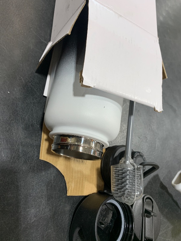 Photo 1 of Lexlion Tea Infuser Bottle - Fruit Infuser Water Bottle 32 Oz, Triple Walled Insulated Stainless Steel Bottle, Thermal Leaf Infuser, Silicone Sleeve, 3 Lids Leakproof, Metal Mug Gallon