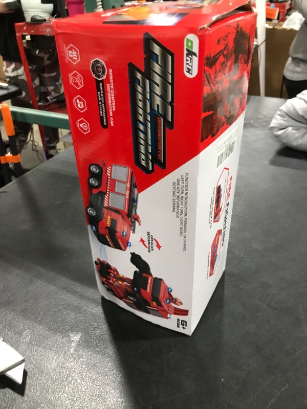 Photo 1 of Remote Control Fire Truck With Led Sounds,RC Fire Truck Car Toy With 3pcs Small Firetrucks 10pcs Roadblock Models, One Button Press Spraying Water Transformer Fire Truck Toys For Kids Toddlers Boys