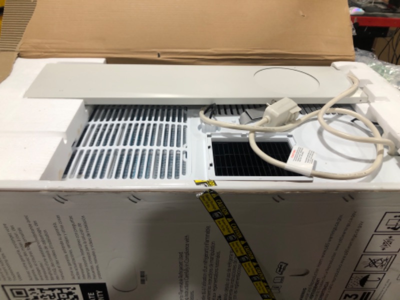 Photo 1 of BLACK+DECKER 12,000 BTU Portable Air Conditioner up to 550 Sq. with Remote Control, White
