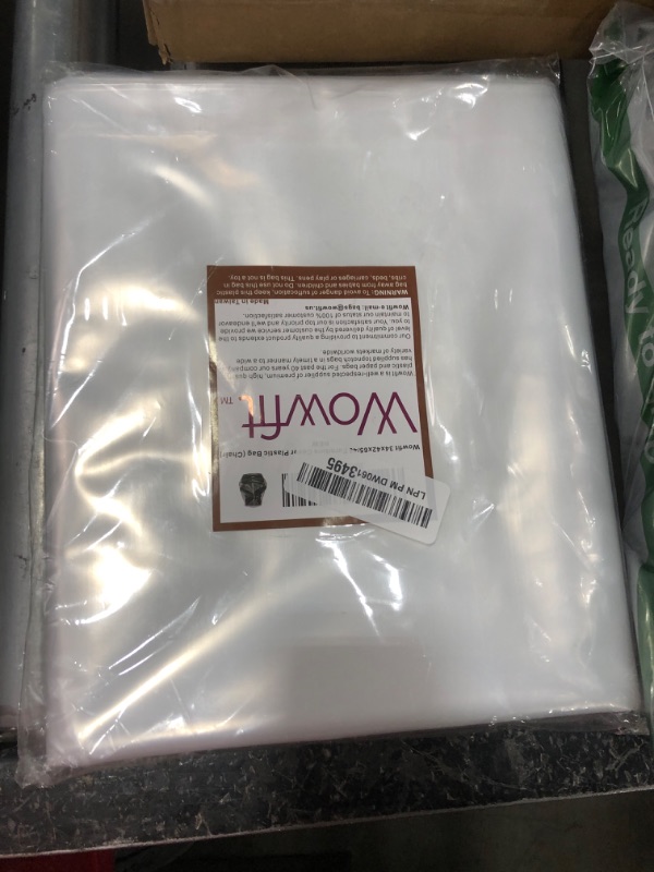 Photo 1 of Wowfit Furniture Cover Dust-Proof Moving Bag for Chairs, Recliners & Boxes – Clear, Odorless Plastic - 4mil-Thick - 34W x 42D x 65/48H Inches (Tape Not Included)
