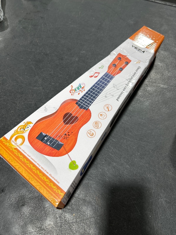 Photo 1 of YEZI Kids Toy Classical Ukulele Guitar Musical Instrument, Brown