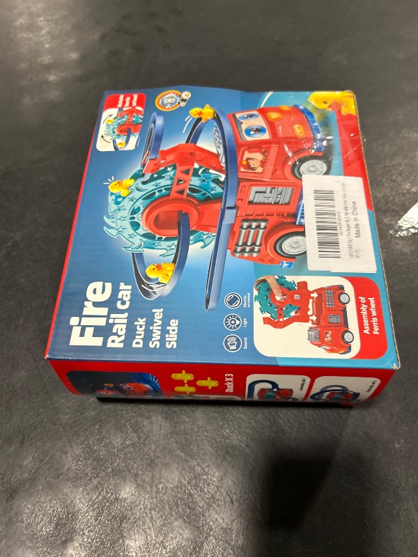 Photo 1 of NEXTAKE 2 in 1 Fire Engine Slide Set, Automatic Duck Race Track With Rotating Ferris Wheel, Fire Truck Toy With Universal Wheel, Movable Eyes, Music & Lights