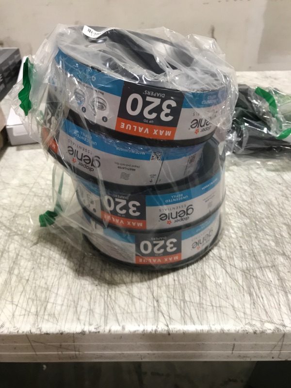 Photo 1 of Diaper Genie Essentials Round Refill Pack of 4 | Holds Up to 1280 Newborn Diapers | Features Unscented Continuous Film | Compatible with Diaper Genie Complete and Expressions Pails