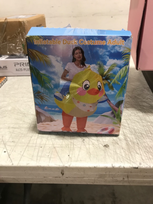 Photo 1 of XYJKIDSES Inflatable Duck Costume for Adult Blow up Costume Halloween Costumes Ride On Duck Funny Animal Costume for Men Women Cosplay Yellow