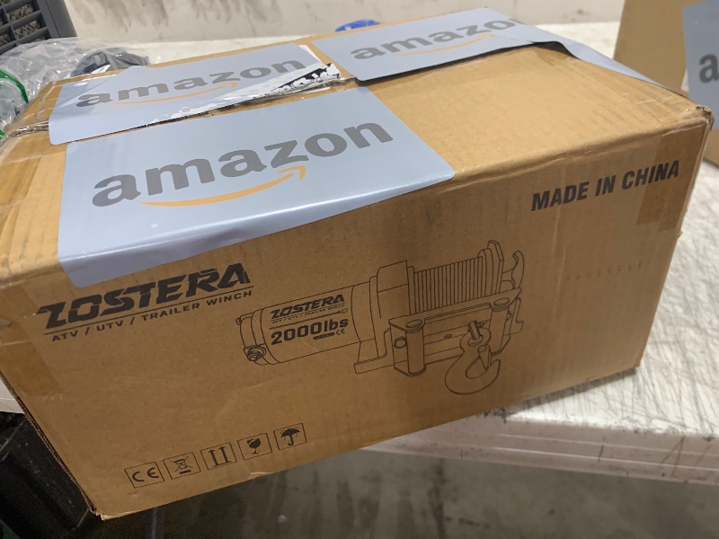 Photo 1 of Zostera 2000lb Winch for ATV, with Steel Cable,ATV Winch with Wired Manual Remote Control Switch,IP65 Waterproof,with Mounting Plate,with Roller Fairlead&Hook