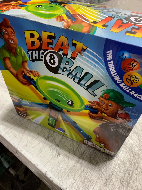 Photo 1 of Tabletop Game for Kids, Family and Adults, Fun Speed and Dexterity Board Game for Game Nights and Parties, Ages 6 & Up, 2 to 4 Players, Beat The 8 Ball by Blue Orange Games