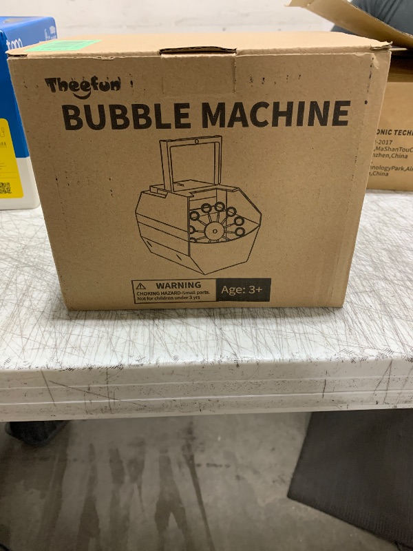 Photo 1 of Theefun Bubble Machine: 500ML Automatic Bubble Blower for Kids and Toddlers, Portable Bubble Maker Operated by Plug-in or Batteries for Parties Weddings Birthday Outdoor and Indoor Black