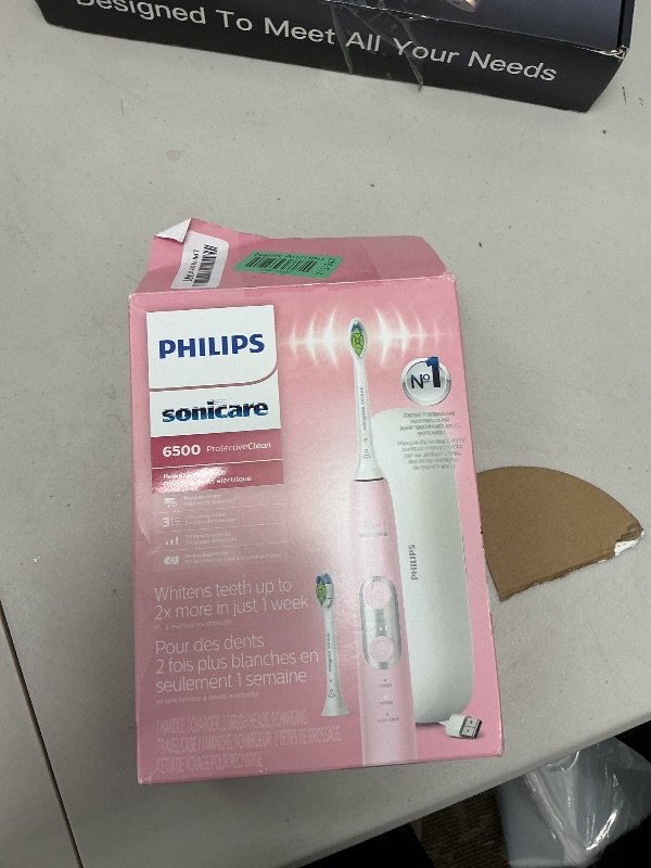 Photo 1 of Philips Sonicare ProtectiveClean 6500 Rechargeable Electric Toothbrush, with Pressure Sensor, 3 Cleaning Modes, SmarTimer and QuadPacer, 14-Day Battery Life, Charging Travel Case, Pink, HX6462/06