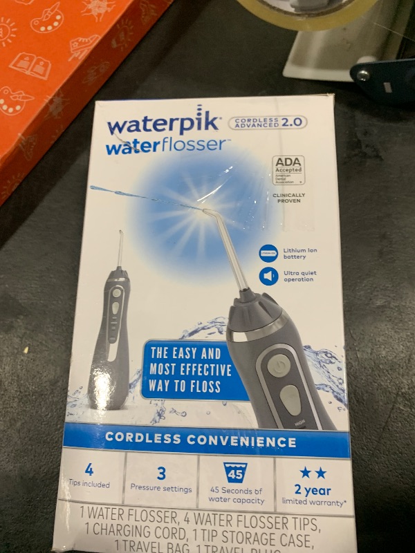 Photo 1 of Waterpik Cordless Advanced 2.0 Water Flosser For Teeth, Gums, Braces, Dental Care With Travel Bag and 4 Tips, ADA Accepted, Rechargeable, Portable, and Waterproof, Gray WP-587, Packaging May Vary