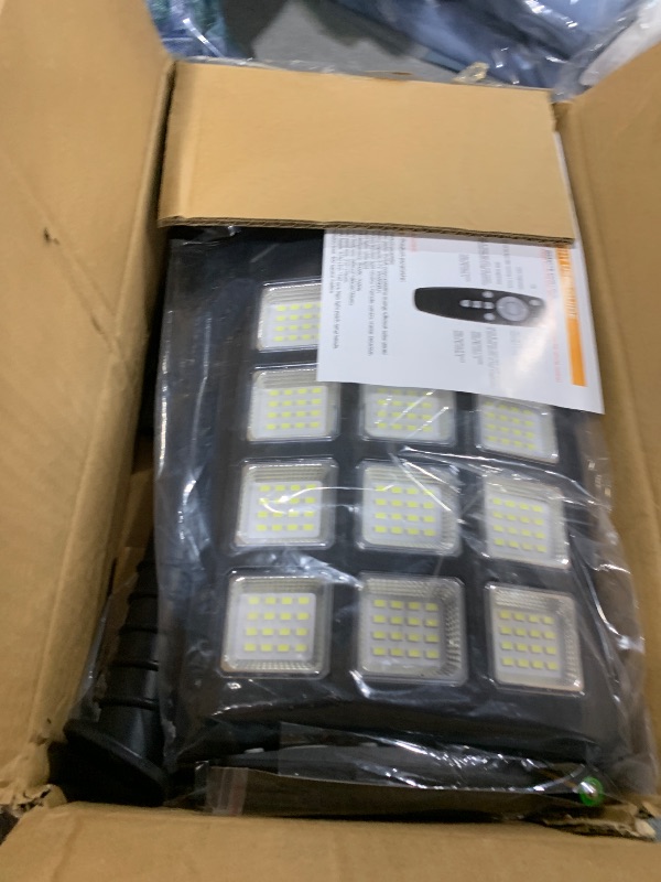 Photo 1 of Aqraou Solar Lights Outdoor for Outside, IP66 Waterproof Solar Street Lights Outdoor with Motion Sensor & Dusk to Dawn, 6500K Security Flood Light for Yard Garden with Remote Control - 2PACK
