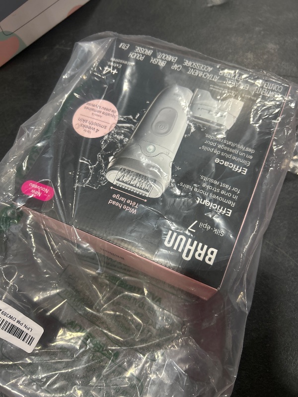 Photo 1 of Braun Epilator Silk-épil 7, Hair Removal Device, Women Shaver & Trimmer, Wet and Dry, Wide Head, Includes Shaver Head and Trimmer Comb, SE7-041, Silver